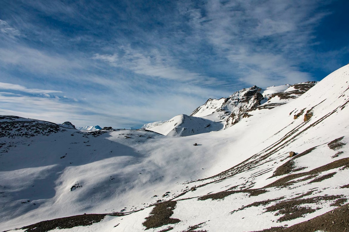 Snowy trail leading to Thorong La Pass