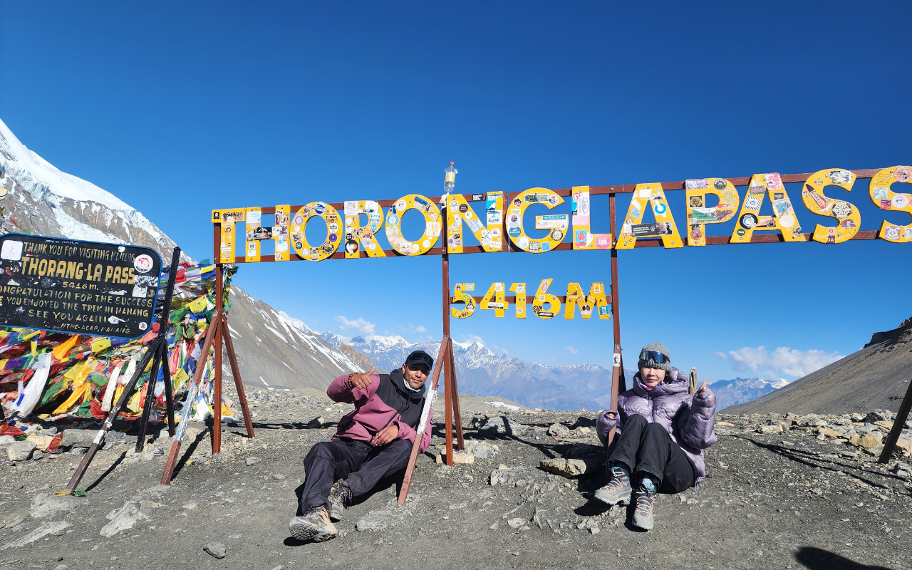 Suraj C.K. celebrating Holi with international travelers during a Nepal travel experience
